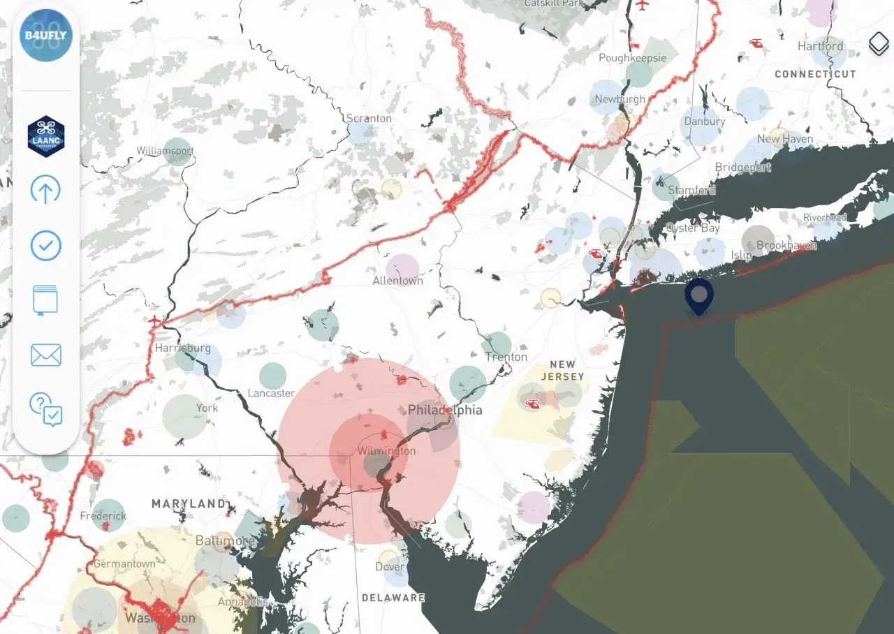 Map showing flight restrictions and drone activity across the Northeast US, with B4UFLY and LAANC logos.