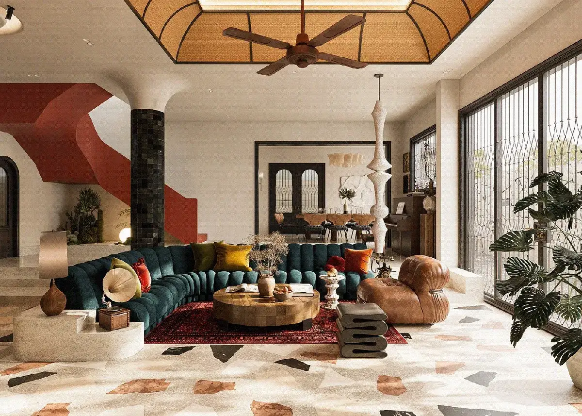 Eklektyczne wnętrze z kaskadowymi schodami, welurową kanapą i terazzo na podłodze. Pokazuje, jakie są style wnętrz, łącząc retro i boho.