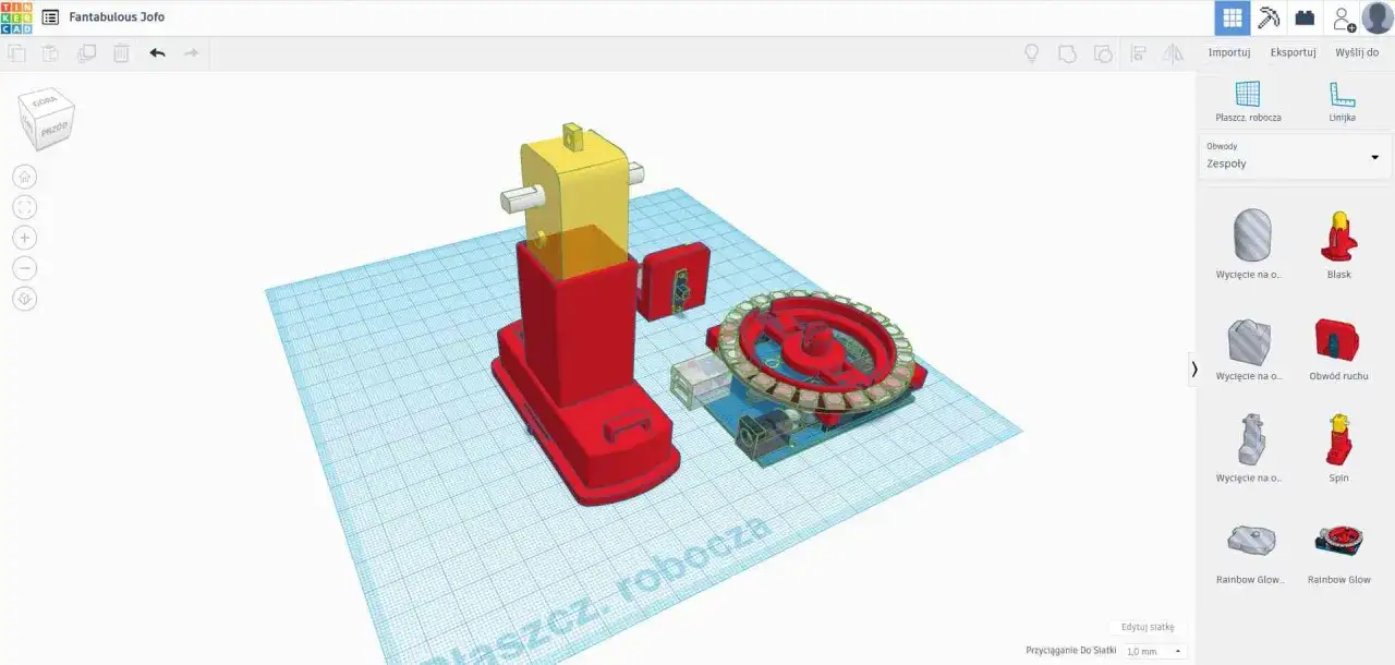W programach graficznych powstaje czerwono-żółty model robota z elementami mechanizmu.