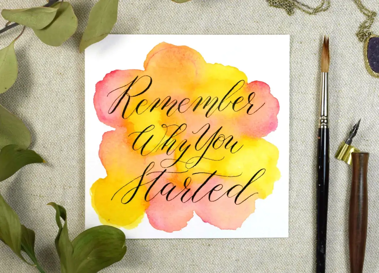 Lettering acuarela con la frase 