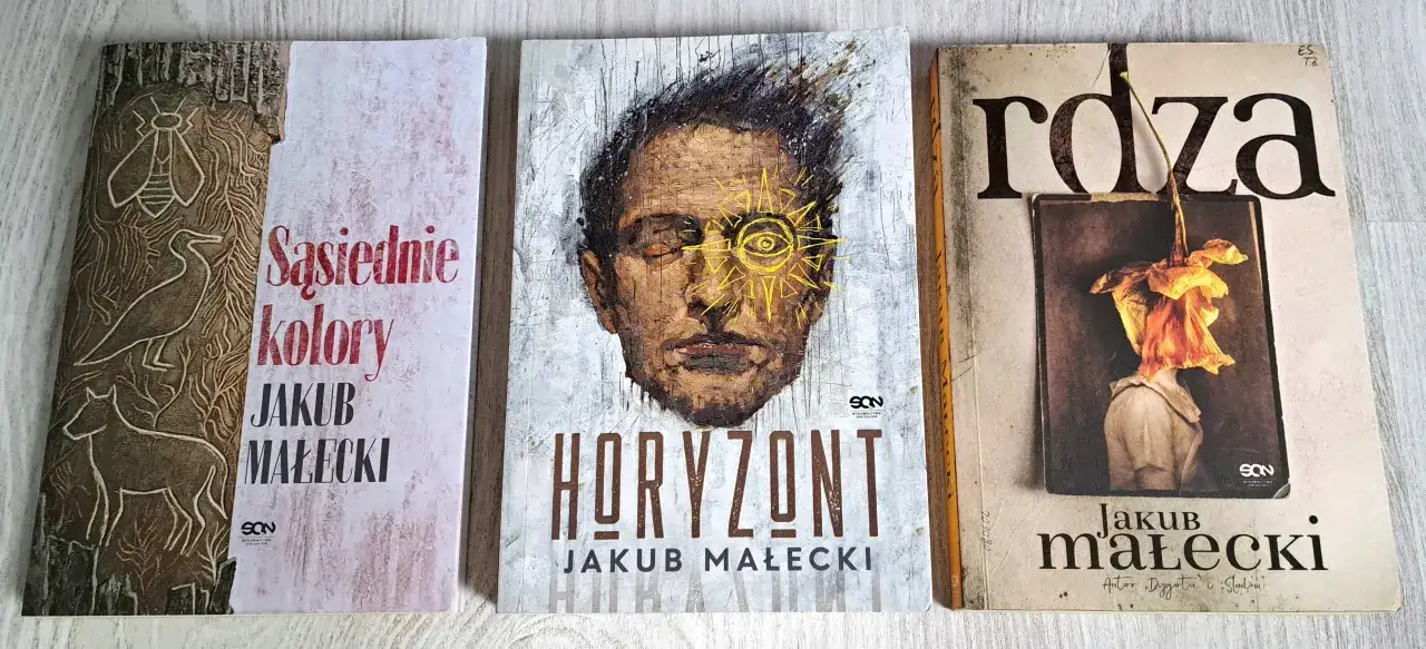 okładki książek Jakub Małecki Rdza Saturnin