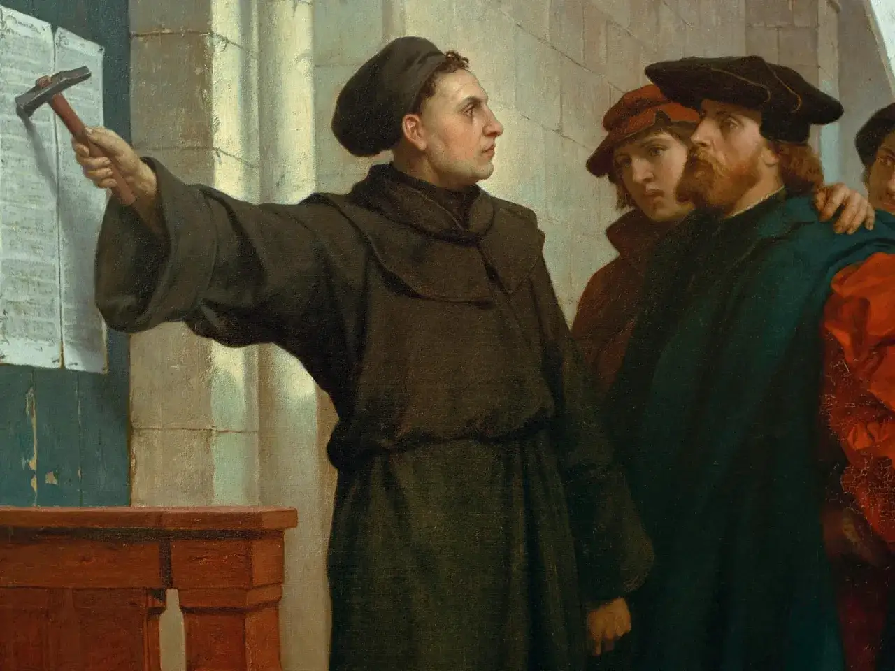 Martin Luther nagelt die 5 wichtigsten Thesen an die Kirchent&uuml;r.