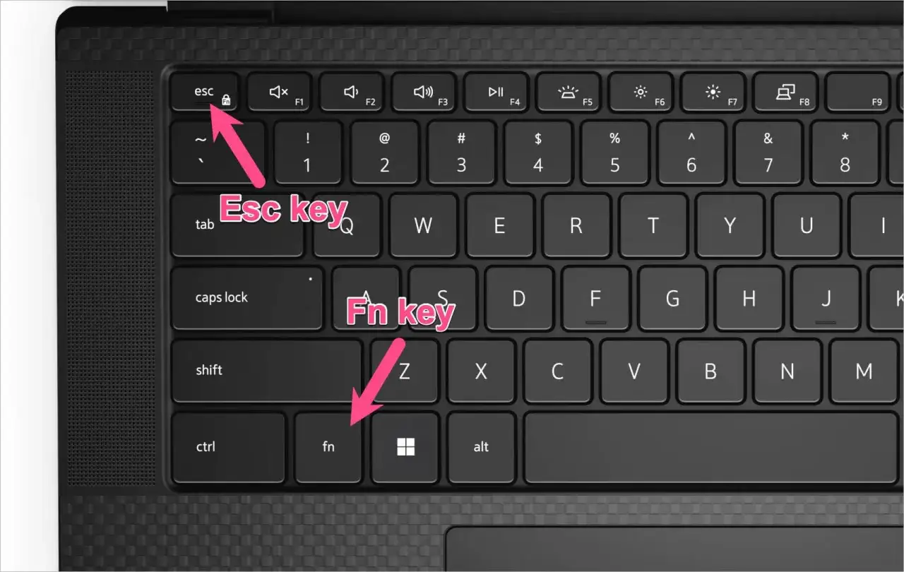 Klawiatura laptopa z zaznaczonymi klawiszami Esc i Fn. Dowiedz się, jak włączyć podświetlenie klawiatury.
