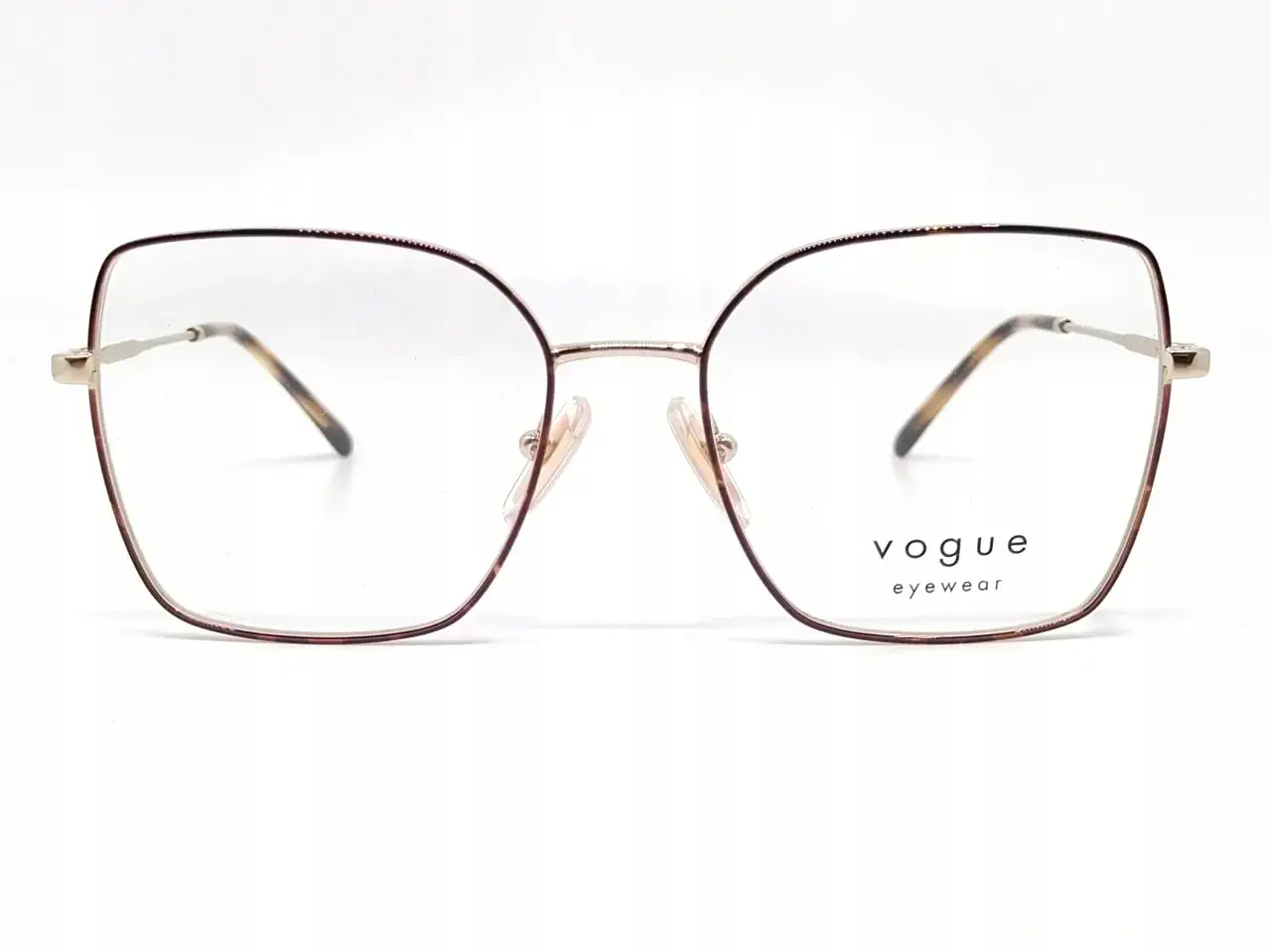Eleganckie okulary Vogue Eyewear w metalowej, brązowej oprawce.