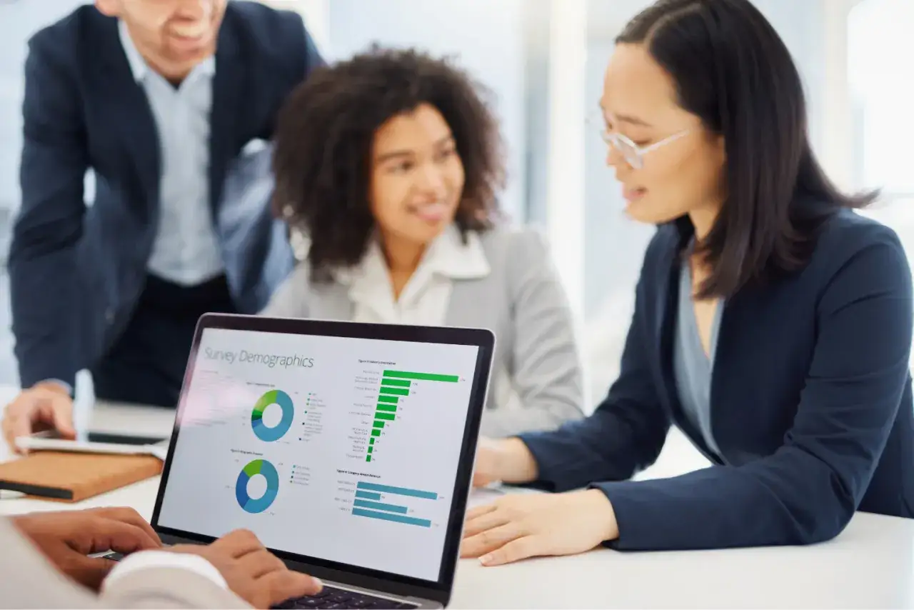 Team members collaborate on survey demographics, fostering workplace engagement and data-driven decisions.