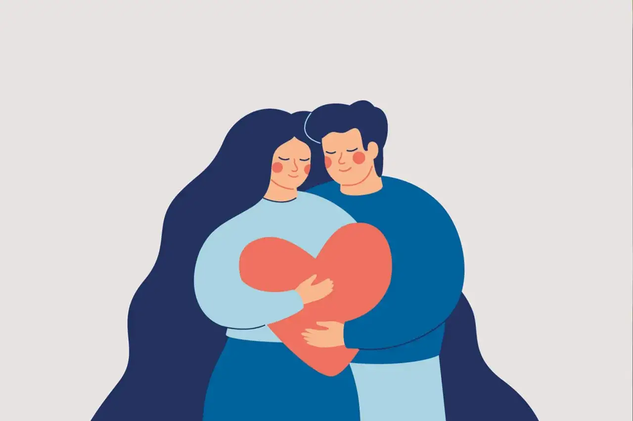 Een man en vrouw omhelzen elkaar met een hart. Het illustreert het 'opposites attract' betekenis: liefde overwint verschillen.
