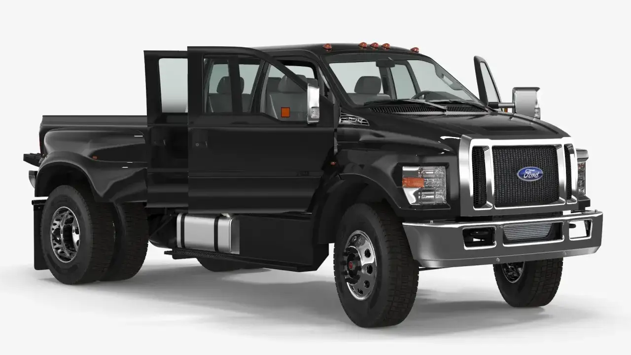 Czarny Ford F650 z otwartymi drzwiami, gotowy do pracy. Potężna maszyna na podwójnych tylnych kołach.