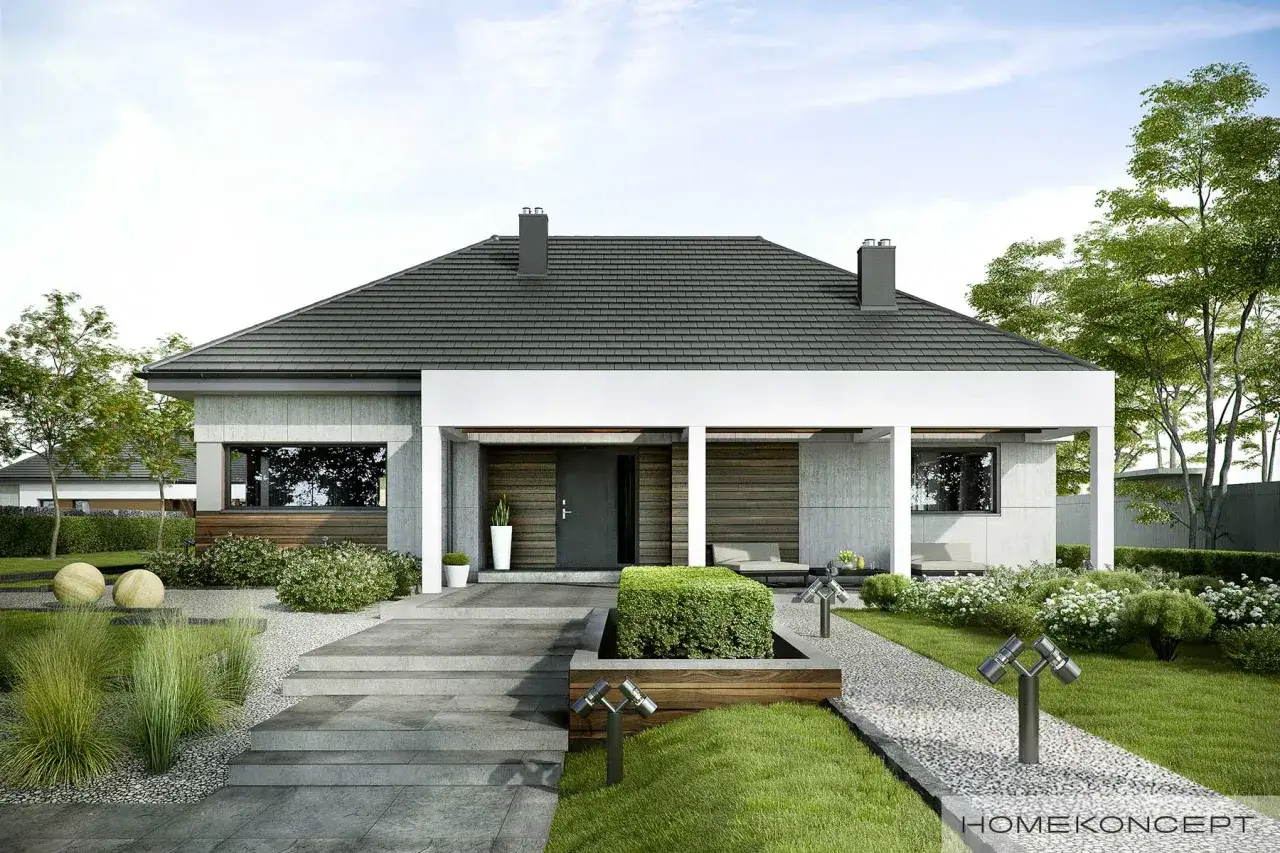 Nowoczesny dom z szarym dachem i betonową elewacją, otoczony zielenią. Symulacja przebiegu słońca podkreśla architekturę.