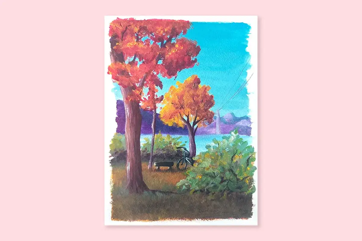 En vacker höstbild målad med gouache. Träd med röda och gula löv står vid en sjö under en klarblå himmel.