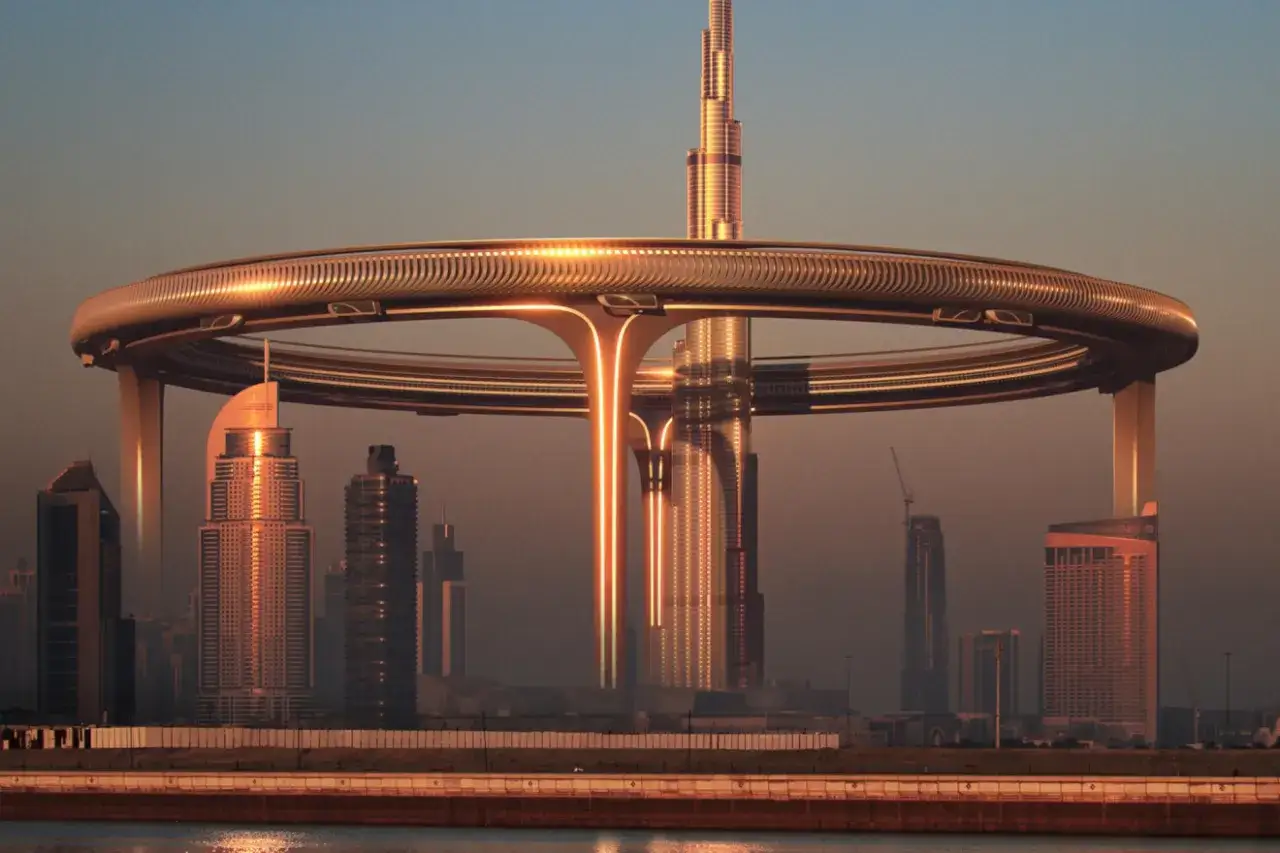Futurystyczna wizja Dubaju z Burj Khalifa w centrum, otoczona pierścieniem, który może skrywać ciekawe burj khalifa ciekawostki.