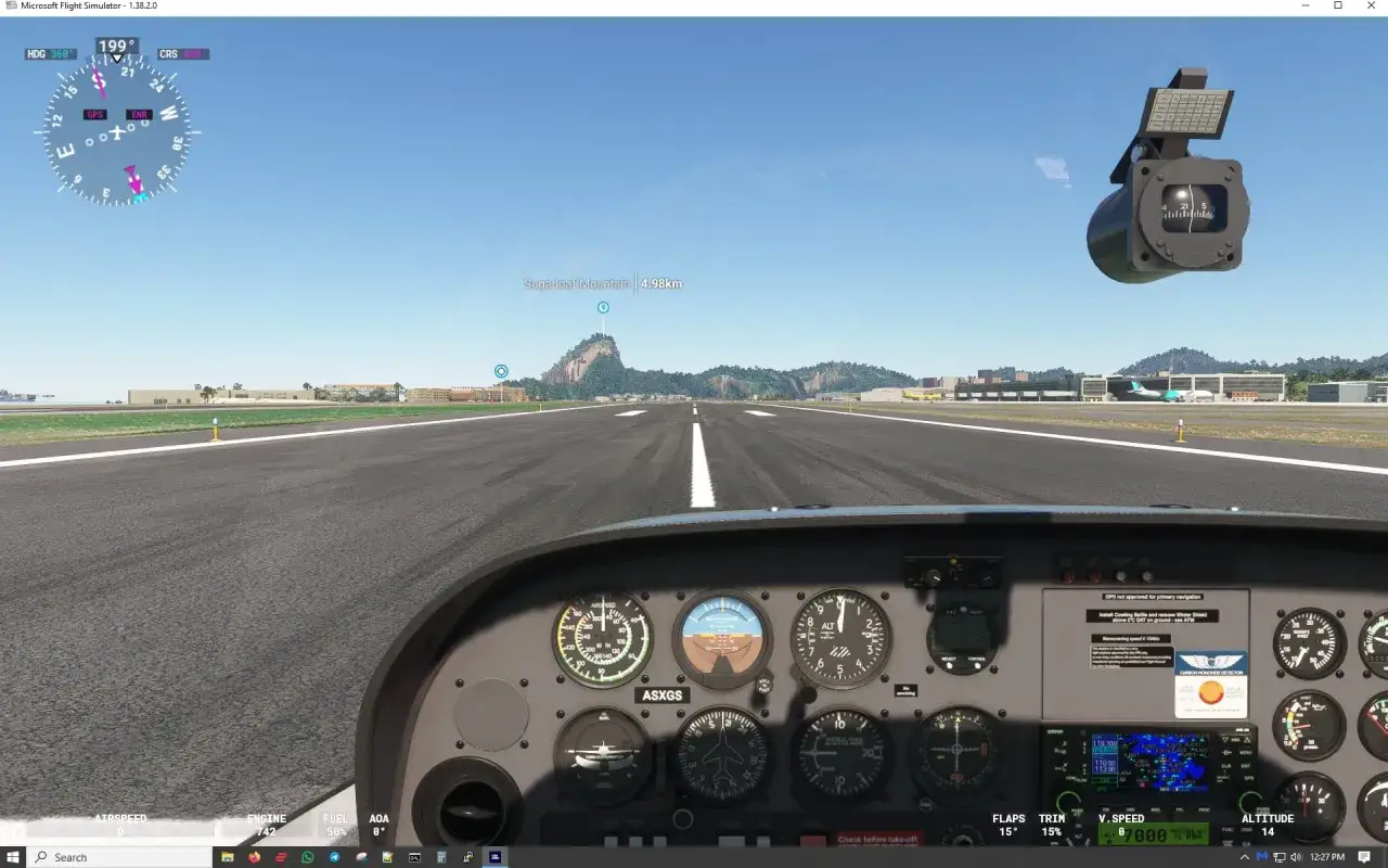 Widok z kokpitu samolotu w Microsoft Flight Simulator, z widocznym Pão de Açúcar. Symulator lotu na Steam.