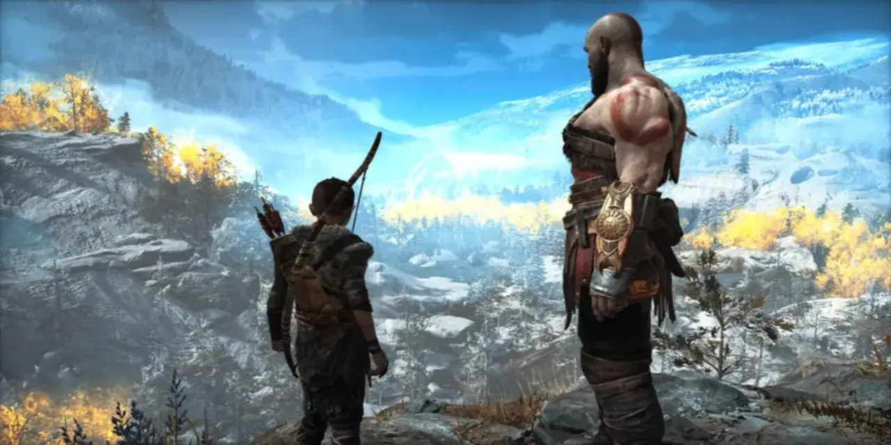 Kratos i Atreus patrzą na zimowy krajobraz. Czas gry w God of War to epicka podróż.