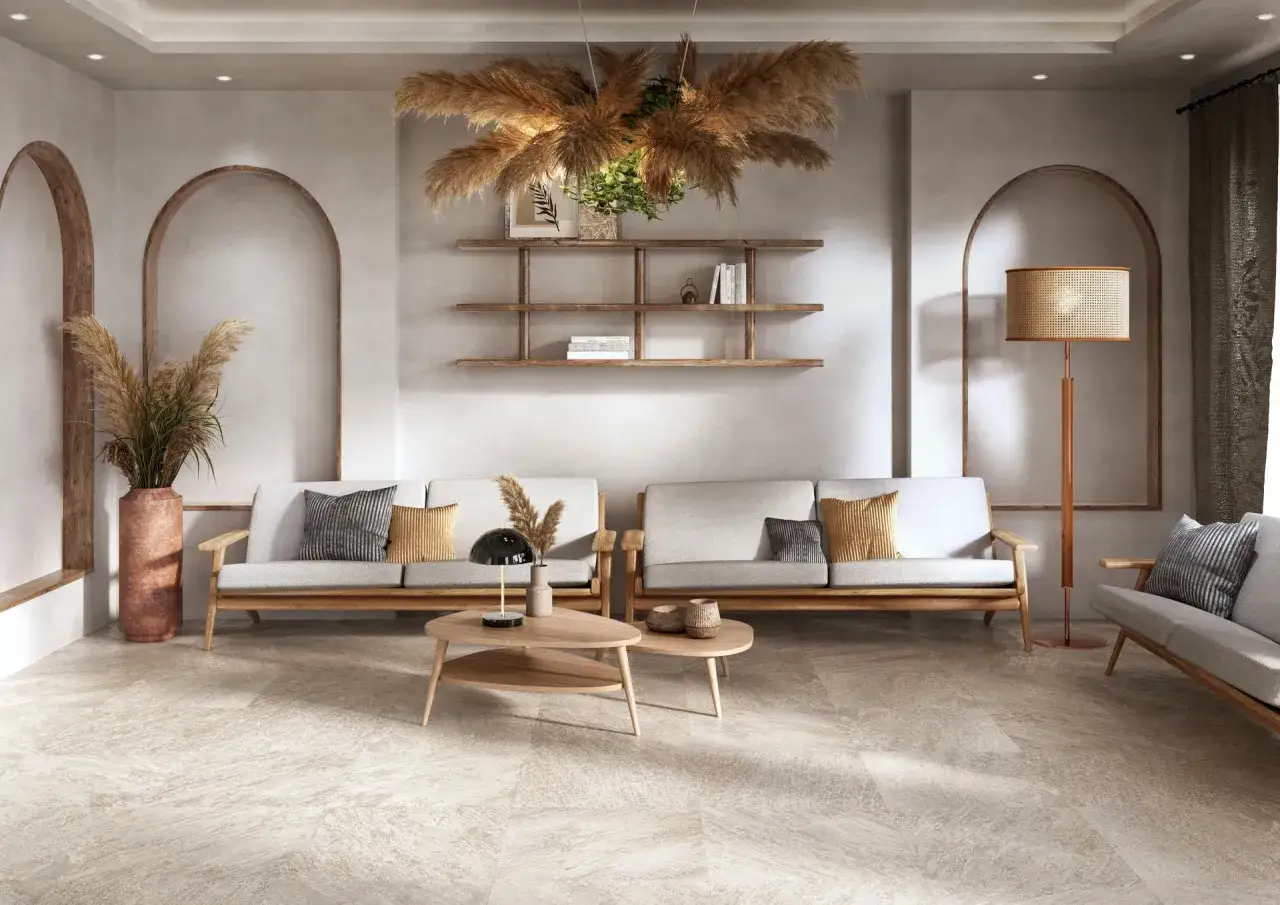 Un accogliente salone rustico con divani in legno, piante di pampas e un tavolino in legno.
