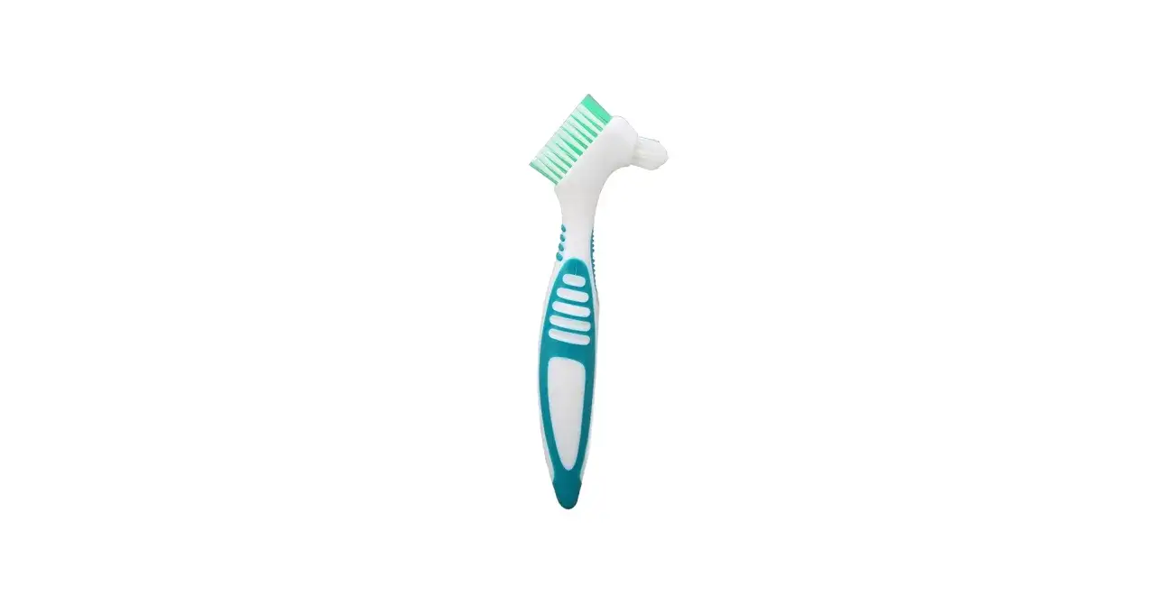 Spazzolino per dentiera con setole su entrambi i lati, ideale per pulire a fondo e mantenere l'igiene.