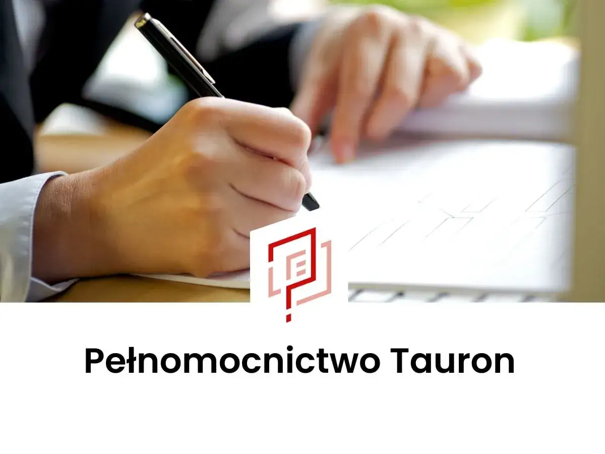 Ręka pisze dokument, widoczne logo Tauron. Pełnomocnictwo Tauron w procesie formalnym.