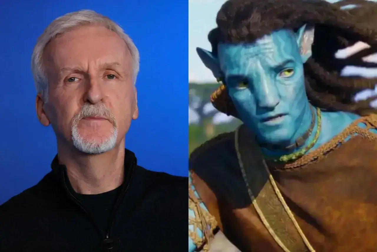 James Cameron, twórca filmów takich jak Avatar, obok postaci Na'vi.