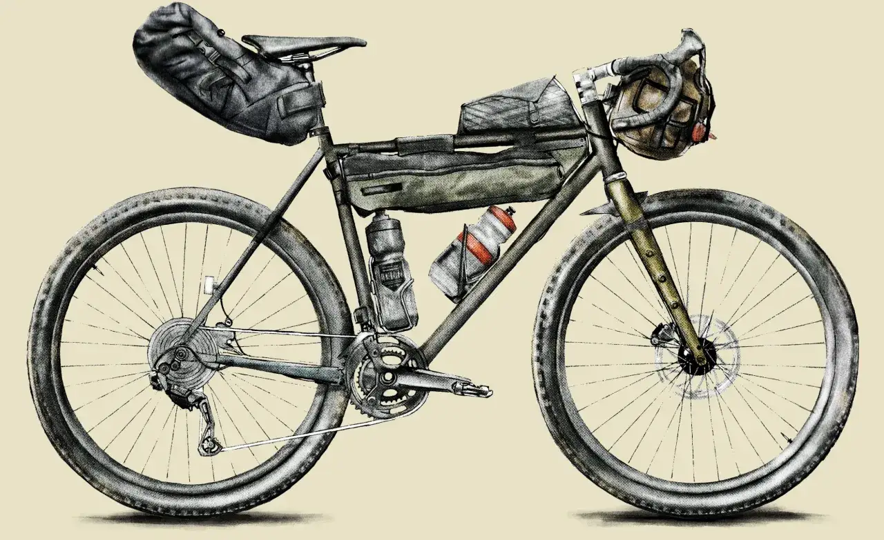 Rower gotowy do bike packingu, z sakwami pod siodłem, na ramie i kierownicy. Idealny na wyprawę.