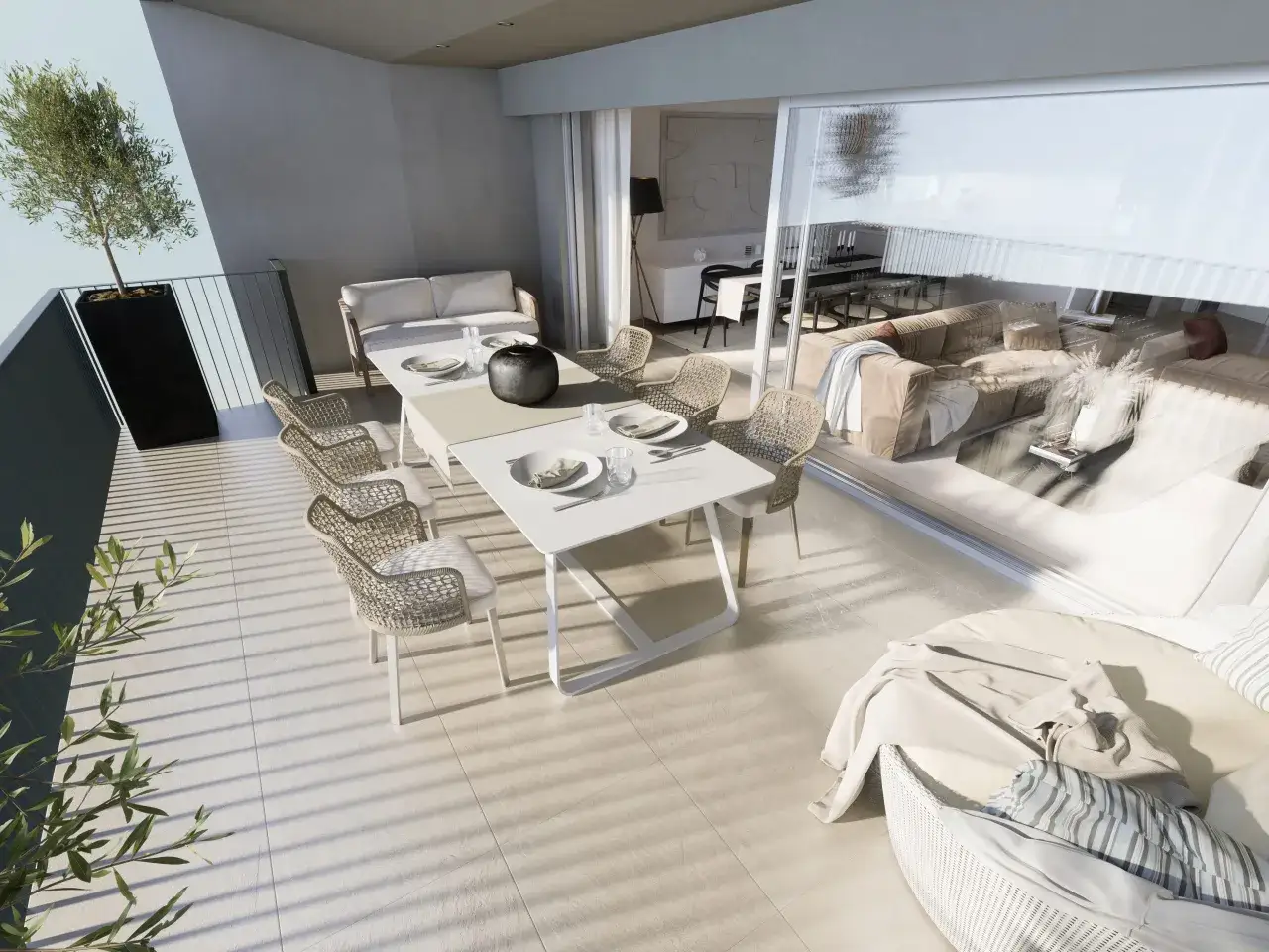 Eine moderne Terrasse mit Essbereich und Lounge-Möbeln, die nahtlos in den Wohnraum übergeht. Ein schöner Unterschied zum klassischen Balkon.