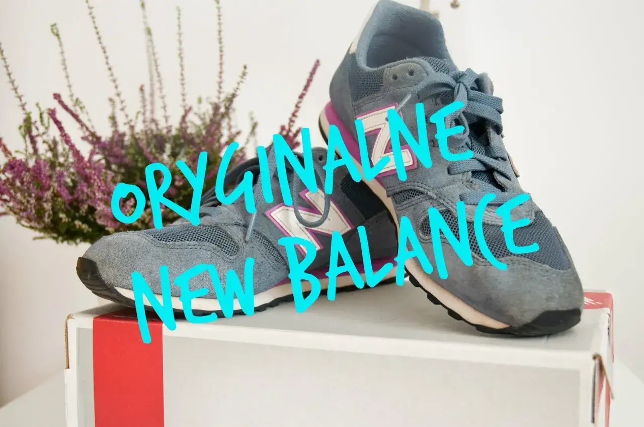 Szare buty sportowe New Balance, z różowymi akcentami, na białym pudełku. Oryginalne New Balance czy podróbki?