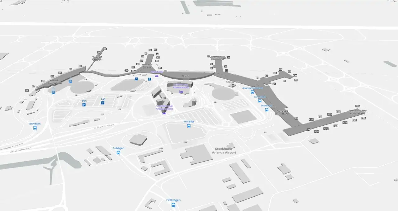 Widok z lotu ptaka na lotnisko Sztokholm Arlanda z terminalami 2, 3, 4 i 5, hotelami i parkingami.
