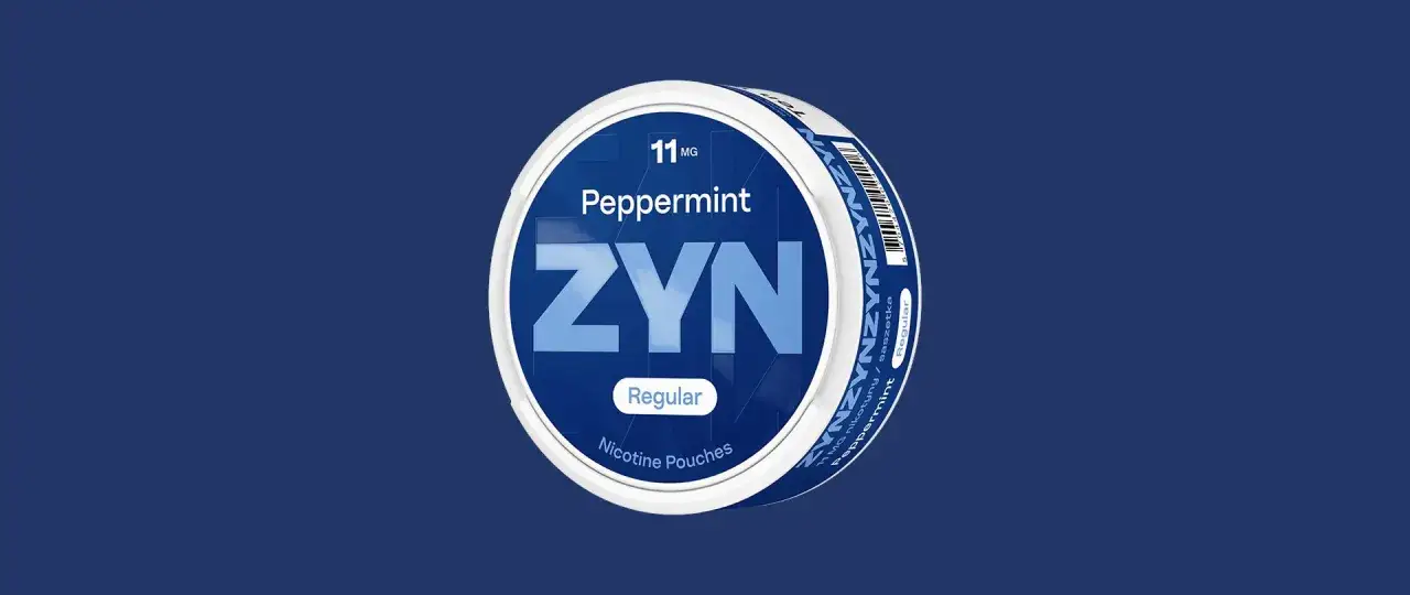 Pudełko z **zyn** o smaku peppermint, 11 mg nikotyny, regular.