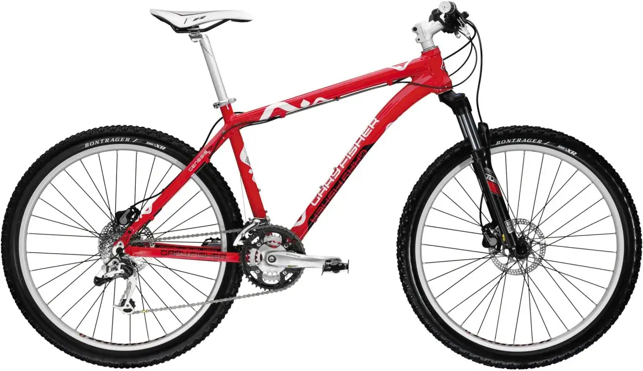A red Gary Fisher Piranha mountain bike with white accents and Bontrager tires, ready for adventure.