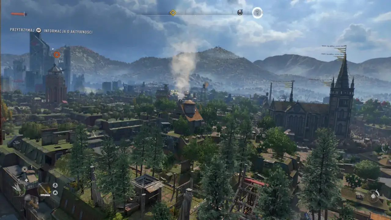 Widok na miasto z gry Dying Light 2. W oddali góry, w centrum dymiący komin. Ten poradnik pomoże Ci przetrwać.