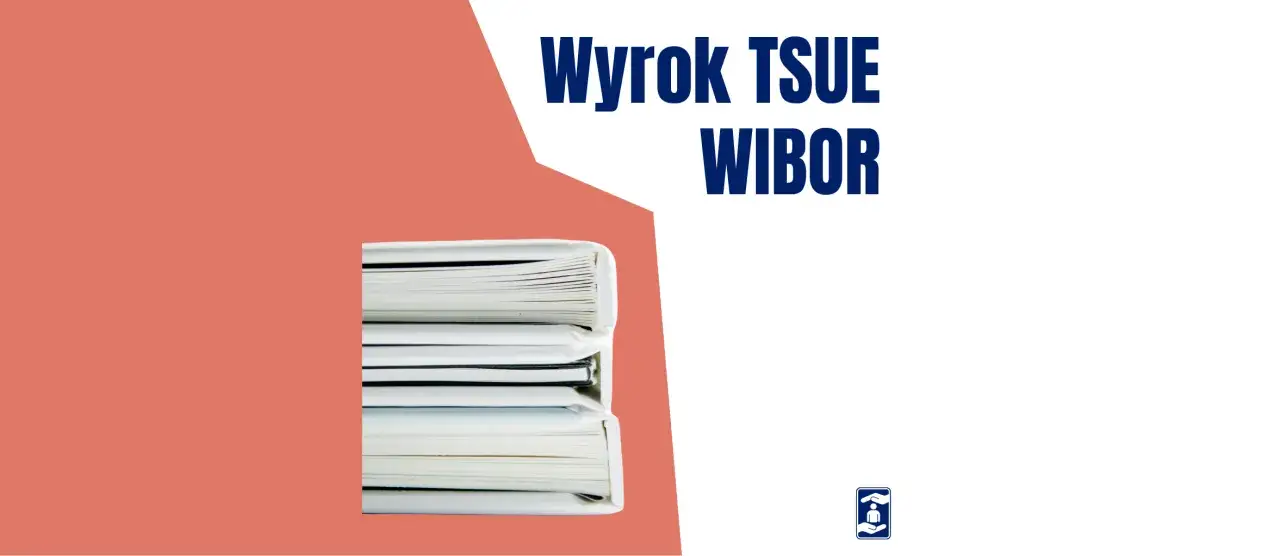 Stos białych ksiąg, na nich napis