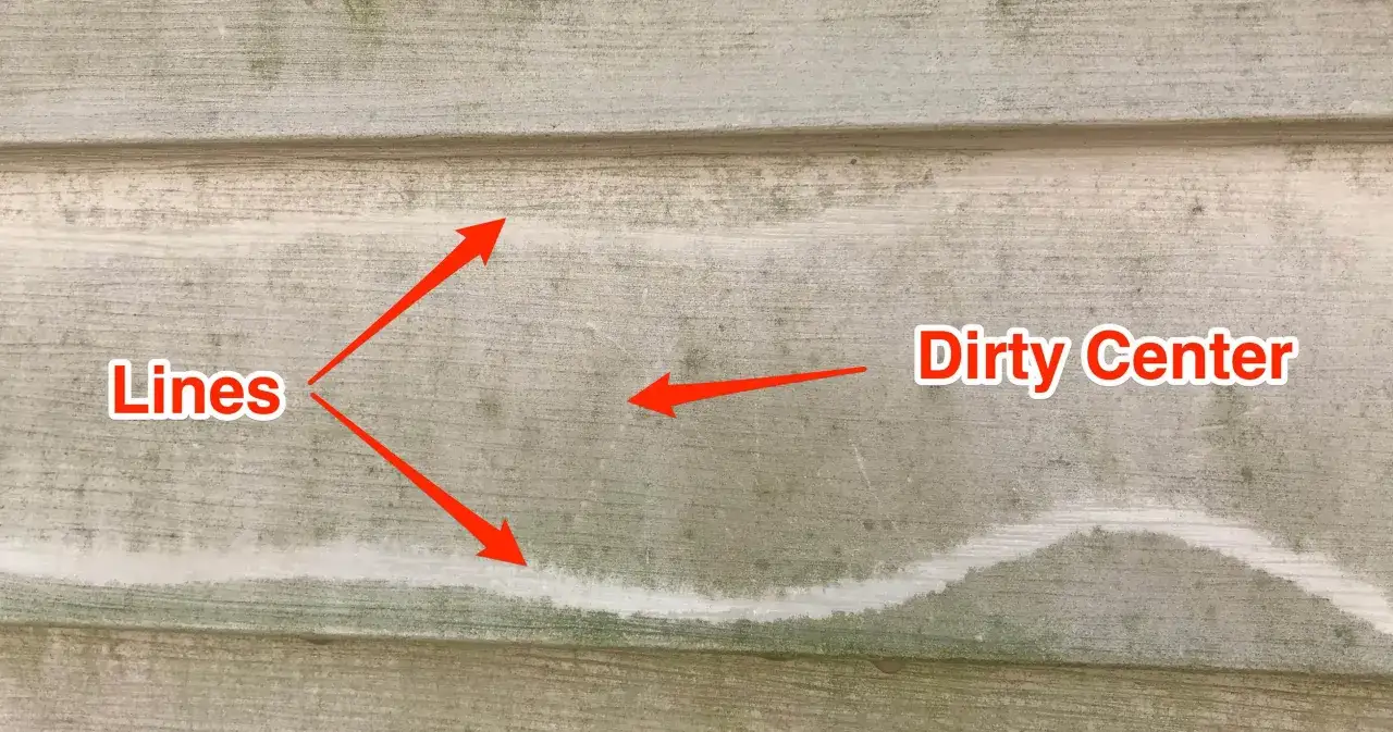 Demonstrates how to use a pressure washer to clean siding, showing the 