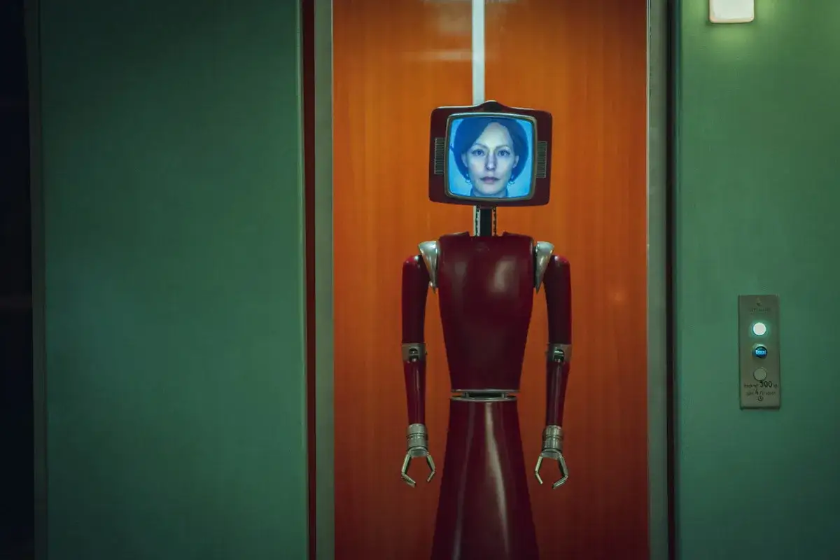 Robot z ekranem zamiast głowy, na kt&oacute;rym wyświetla się twarz kobiety, niczym z serialu 