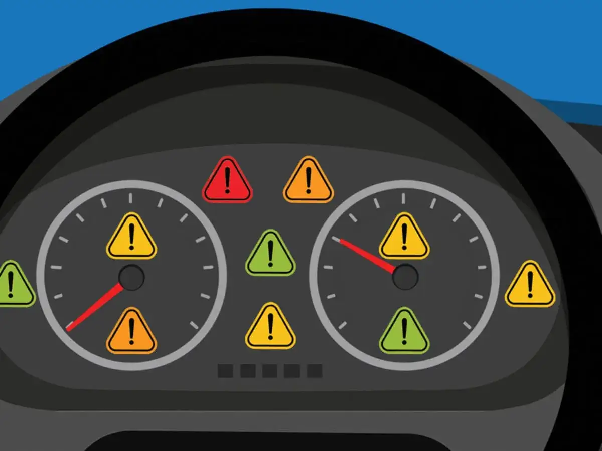 Panel de control de un coche con varios s&iacute;mbolos de advertencia. El s&iacute;mbolo de dep&oacute;sito de agua del coche podr&iacute;a estar entre ellos.