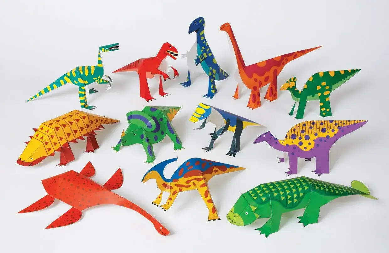 Un gruppo di colorati dinosauri da costruire con la carta, pronti per un'avventura preistorica.