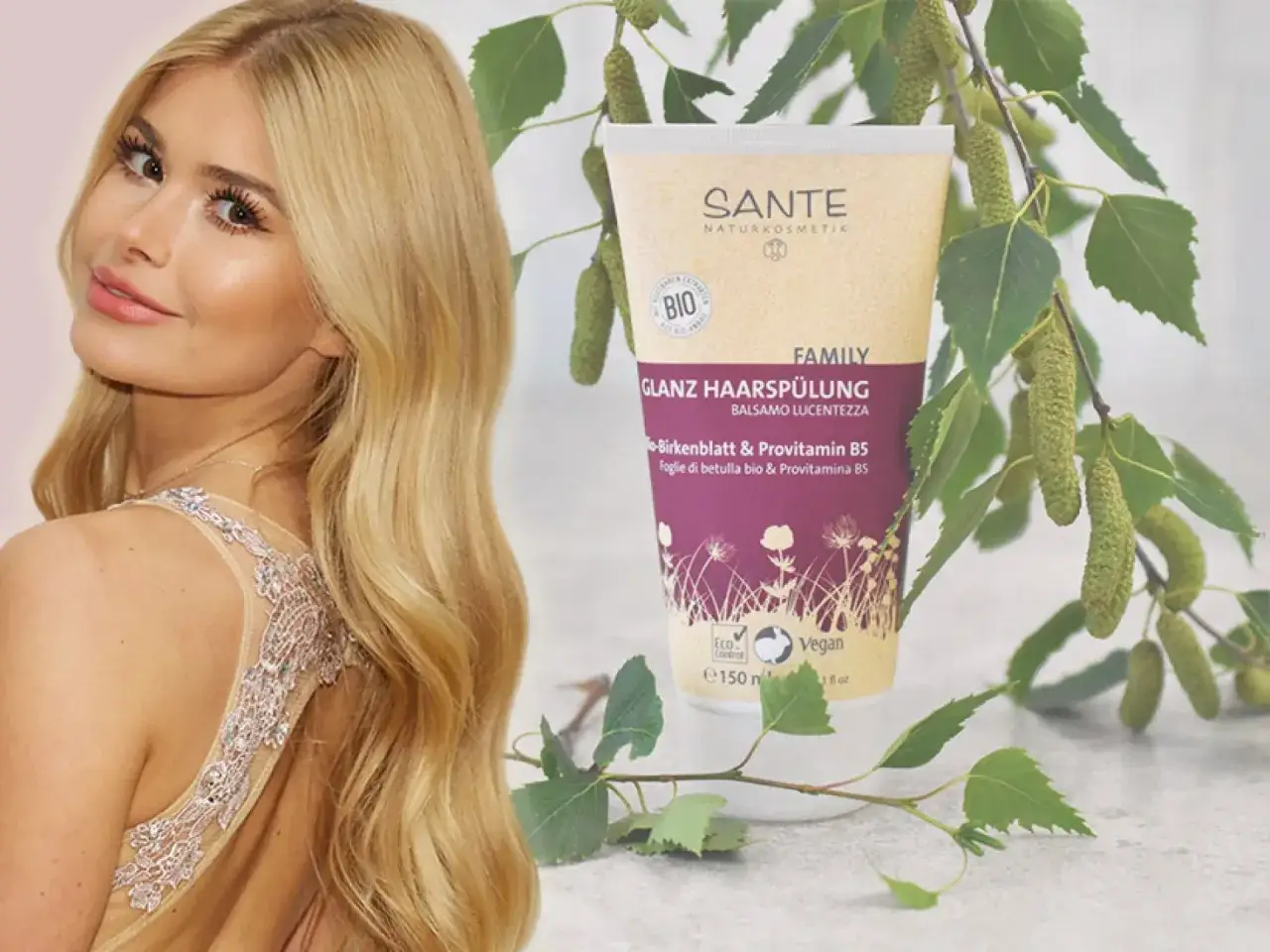 Frau pflegt ihre blonden Haare mit Maske