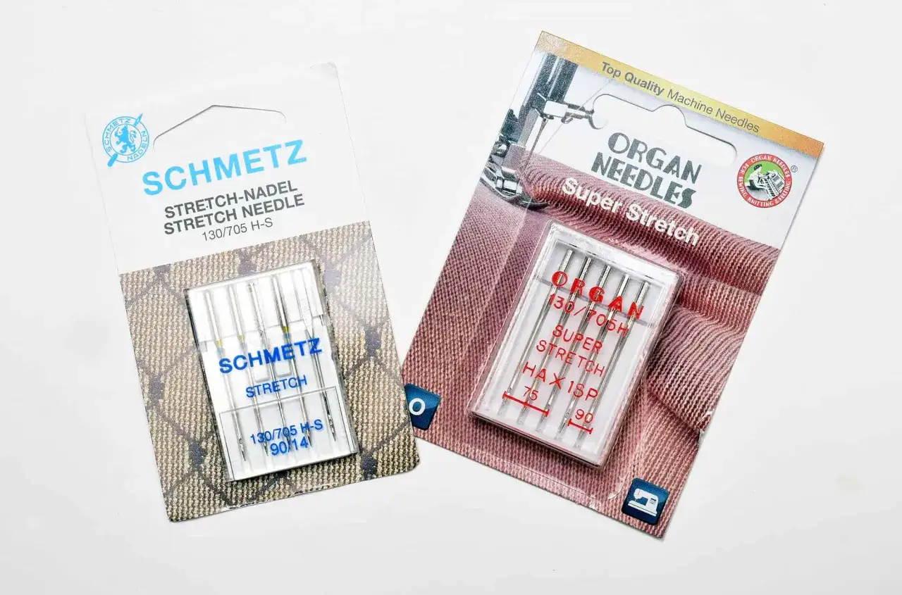 Two packs of sewing machine needles for knits: Schmetz Stretch and Organ Super Stretch.