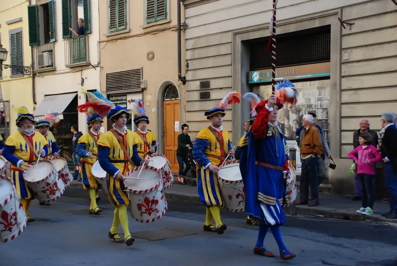 A drum procession in historical costumes, celebrating Easter in Europe.
