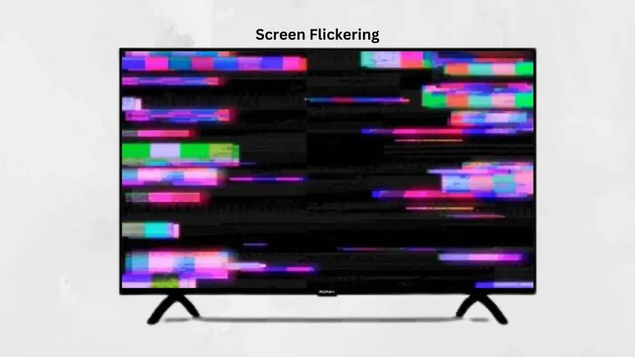 Telewizor z migoczącym obrazem, pełnym kolorowych zakłóceń. Czy kabel HDMI może się zepsuć? Taki obraz sugeruje problemy z sygnałem.