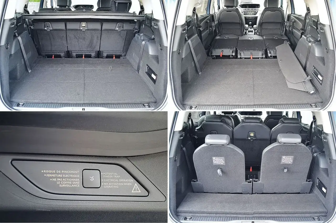 Wnętrze Citroen C4 Grand Picasso 2.0 HDI: pusta przestrzeń bagażowa, złożone siedzenia, ostrzeżenie o elektrycznym domykaniu klapy.