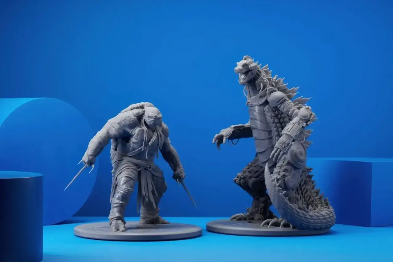 Szare modele postaci, w tym cyborg Godzilla i wojownik, wykonane przez drukarka 3d modele, stoją na niebieskim tle.