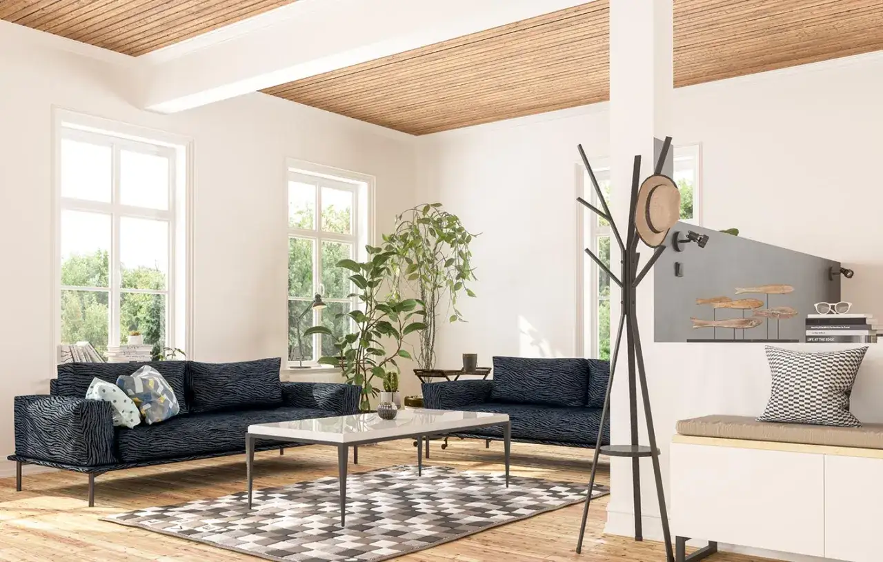 Gemütliches Wohnzimmer mit Holzbalkendecke, die tolle Deckenverkleidung Ideen bietet. Dunkle Sofas, Teppich und Pflanzen schaffen Atmosphäre.