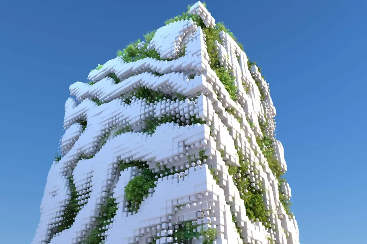 Edificio futuristico con blocchi bianchi e vegetazione rigogliosa, un esempio di architettura con materiali ecosostenibili.