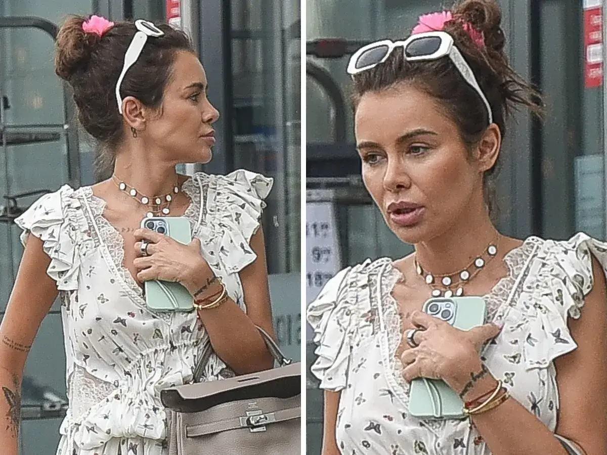 Natalia Siwiec w zwiewnej sukience w motyle, z okularami na głowie i torebką. Jej stylizacje zawsze przyciągają uwagę.