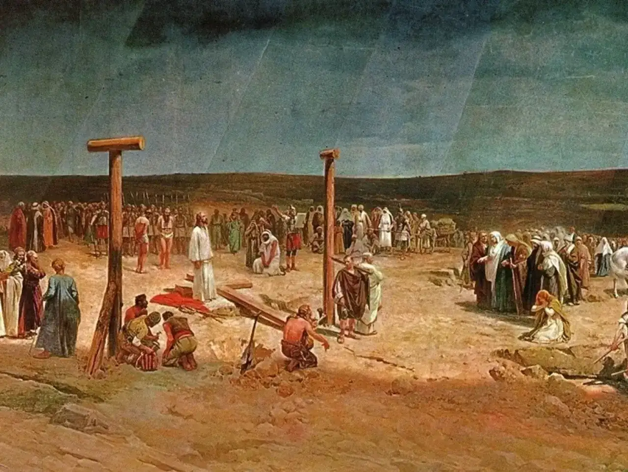 Scena ukrzyżowania Jezusa. Tłum ludzi obserwuje wydarzenie, niektórzy klęczą.