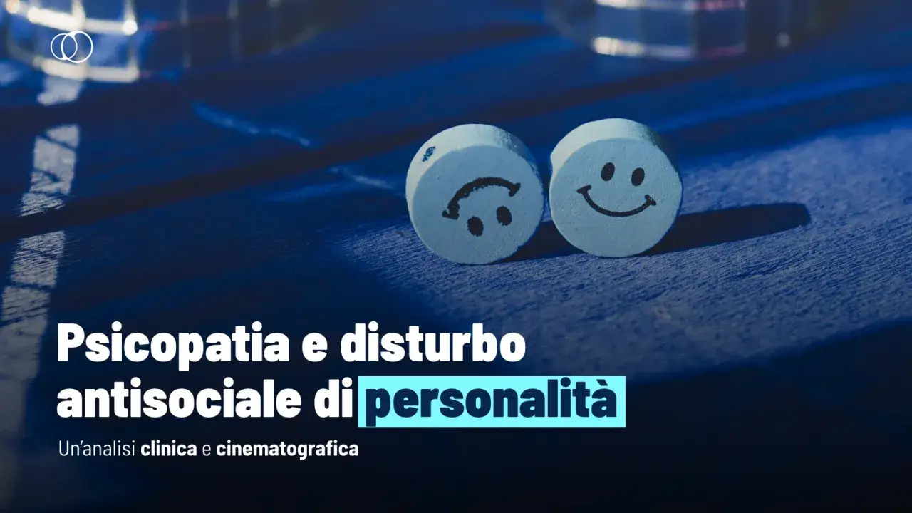 Due pillole blu, una con un'espressione triste, l'altra felice, simboleggiano i comportamenti antisociali e la psicopatia.
