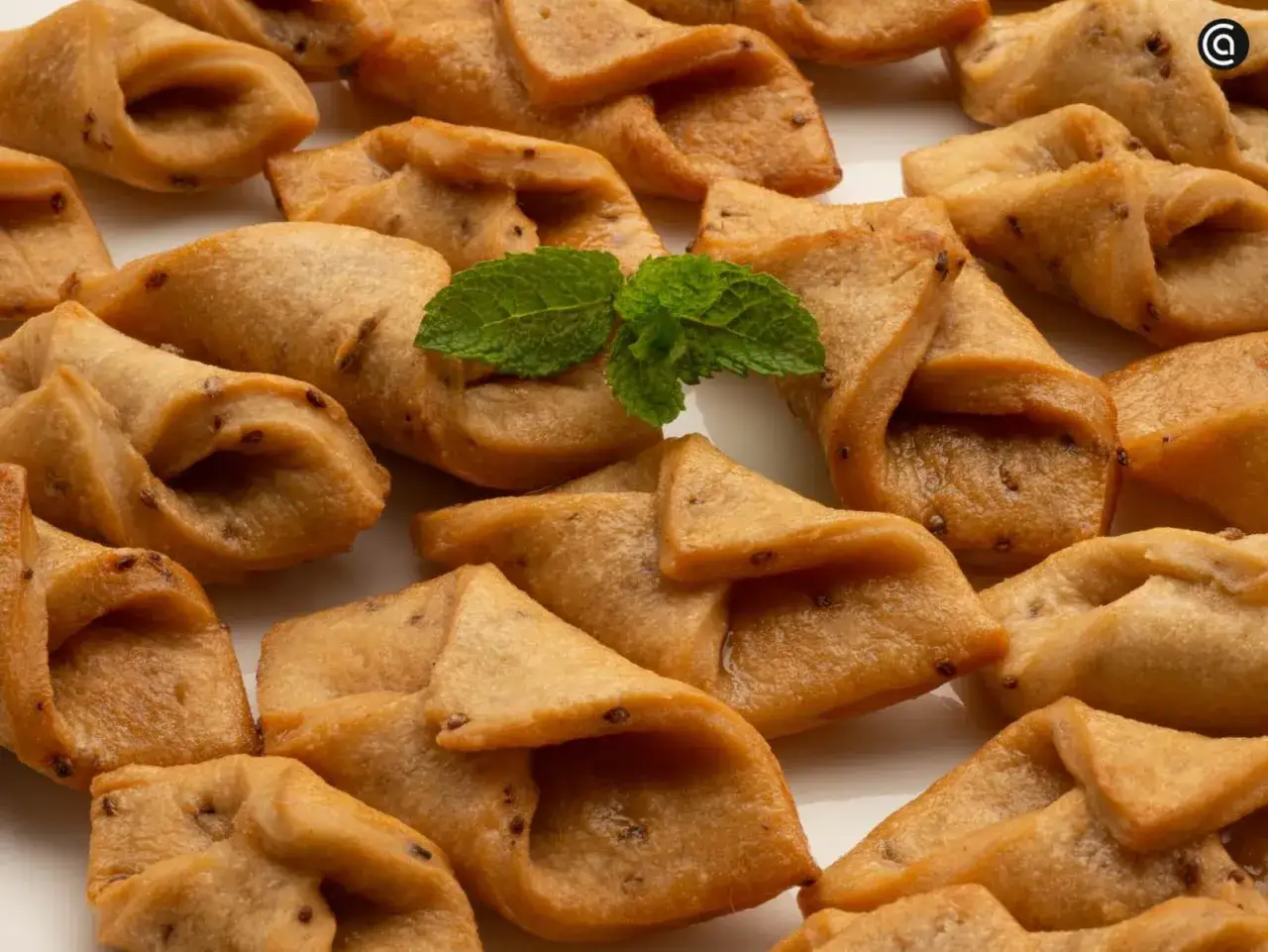 Deliciosos pestiños caseros, crujientes y dorados, perfectos para acompañar un café. ¡Una receta tradicional que enamora!
