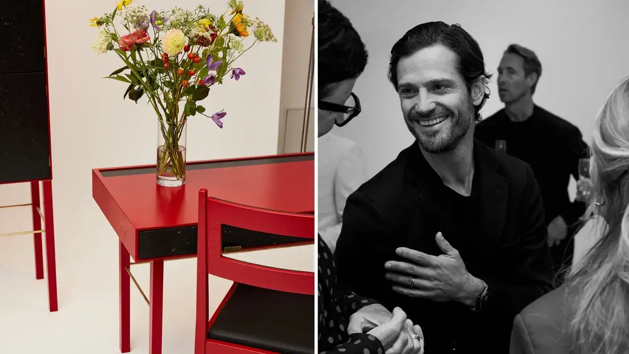 En blomsterbukett på ett rött skrivbord, bredvid en bild av Carl Philip Design i samtal.