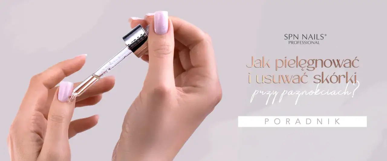 Dłoń z zadziorami przy paznokciach, aplikująca olejek. Poradnik SPN Nails.