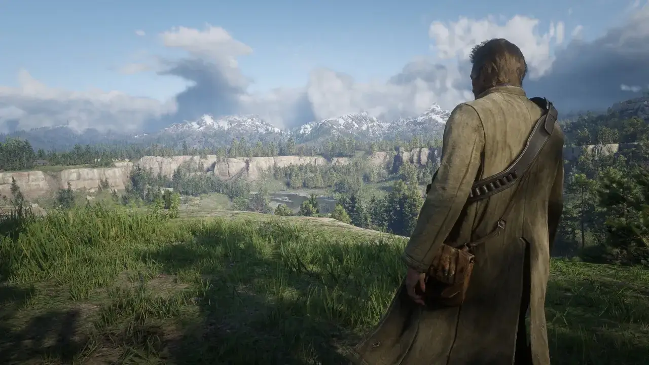 Un vaquero observa un vasto paisaje montañoso, un escenario perfecto para tu **guía Red Dead Redemption 2**.
