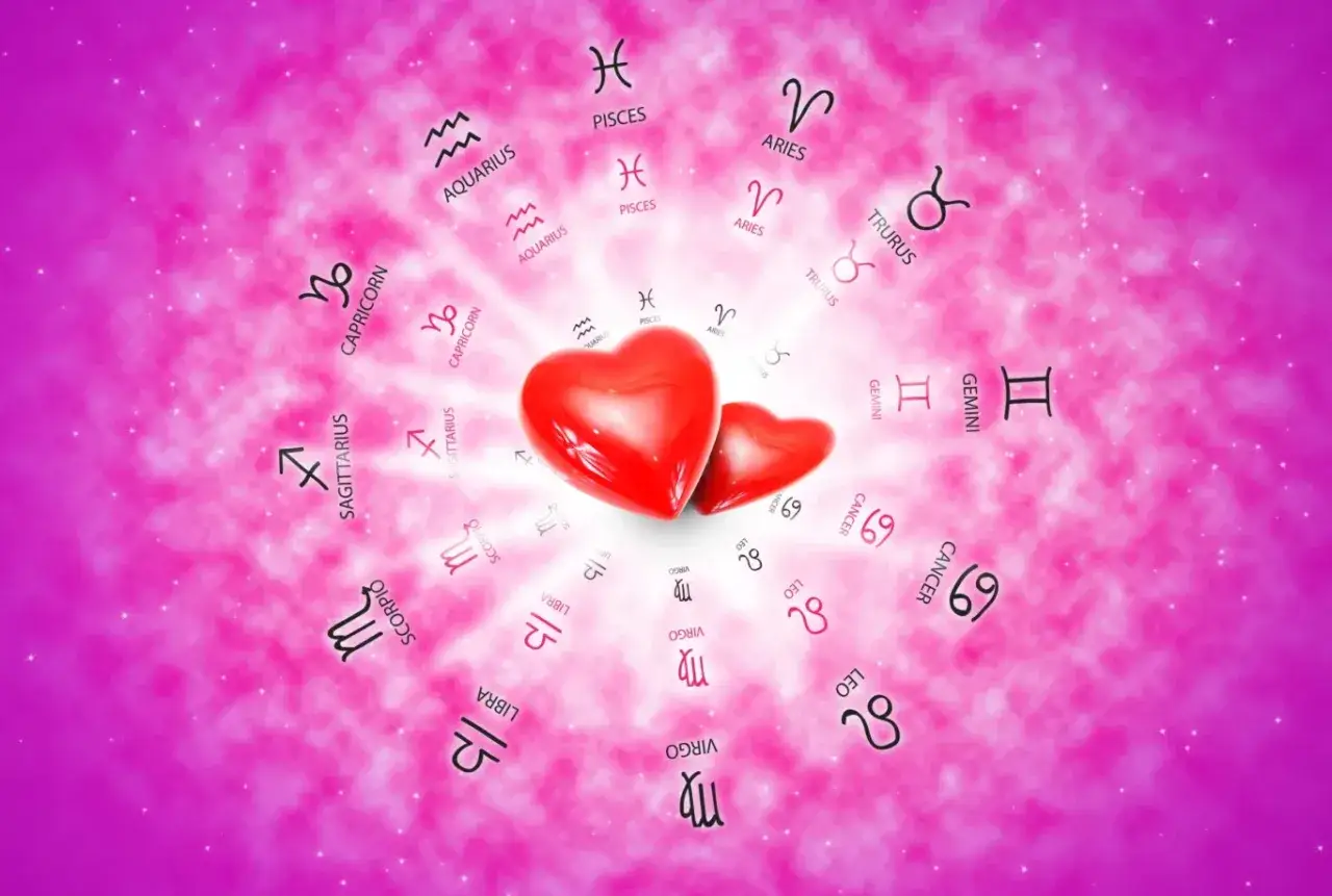 Dwa czerwone serca otoczone znakami zodiaku. Idealny horoskop dla samotnych panien szukających miłości.