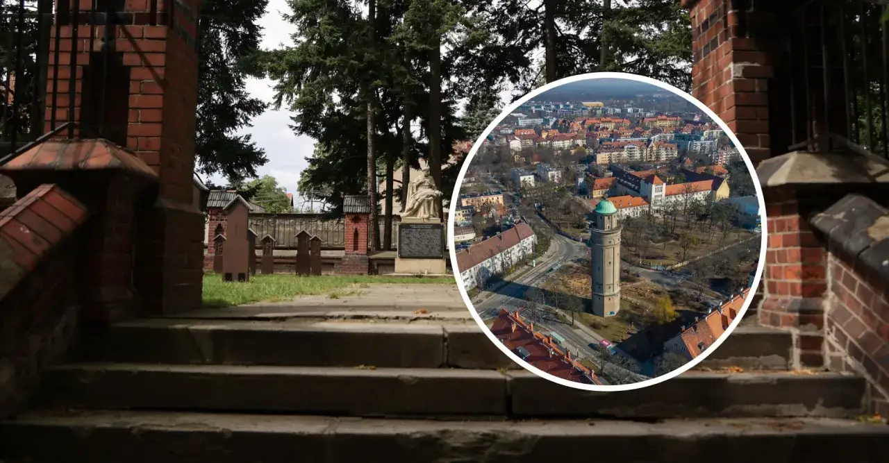Widok na wieżę ciśnień i zabudowania w Karłowicach, z perspektywy schodów cmentarza.