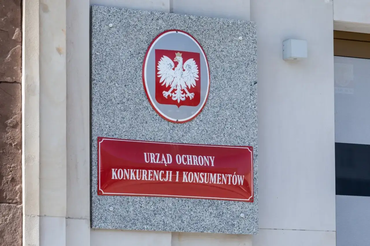 UOKiK logo i symbol sprawiedliwości